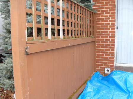 Wood restoration: Painted wood fence in need of stripping and repainting