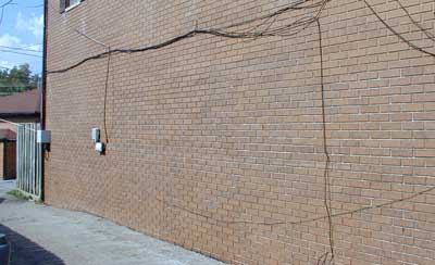 Brick wall after graffiti removed