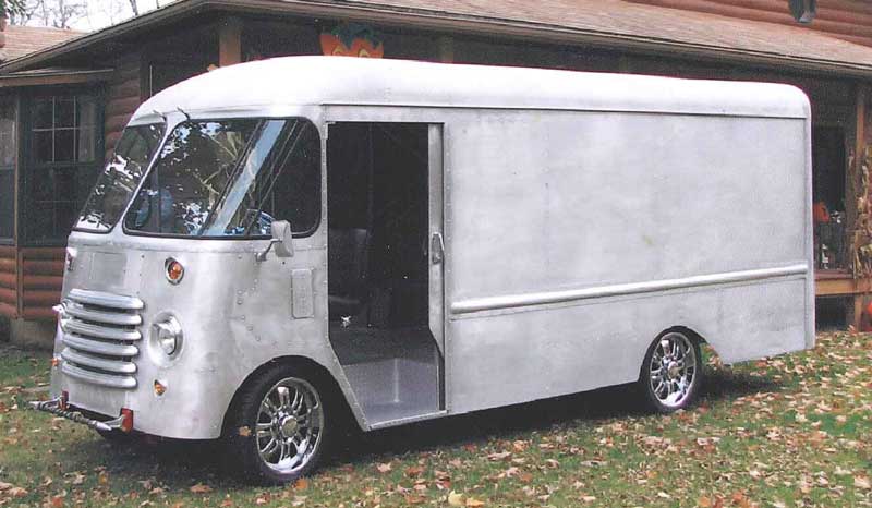 Paint and metal stripping.  Vintage milk truck after soda blasting removed all paint and rust.