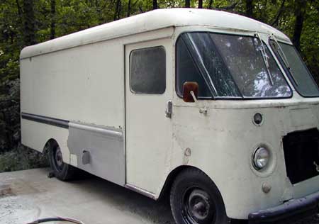 Paint and metal stripping.  Vintage milk truck at the beginning of restoration. 