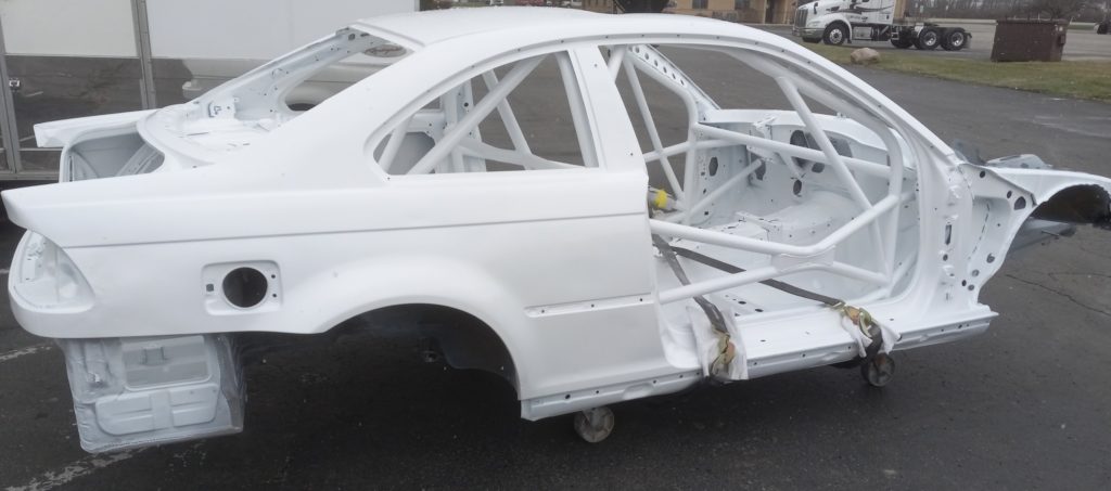 Media blasting & powder coating.  This is the BMW Racer after white powder coating was applied to the entire auto.